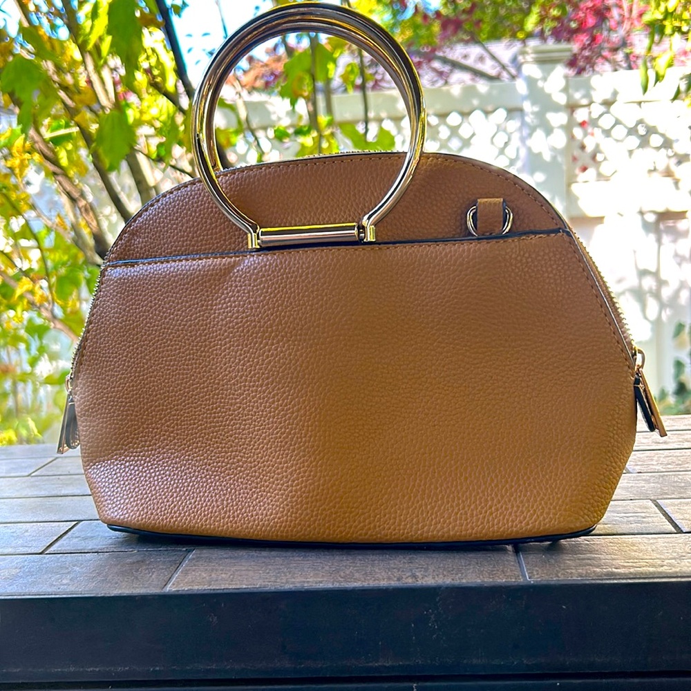 Sondra Robert’s mustard and gold Purse